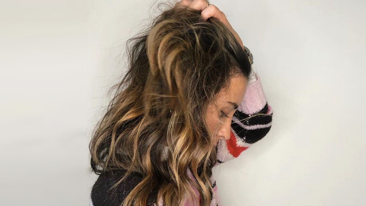 Is your hair frizzy? Learn to tame unruly flyaways!